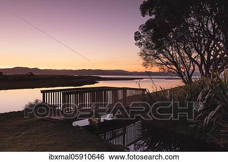 Stock Photograph - Sunset at Kuaotuno River, Oceania, Whitianga, East Coast of the Coromandel Peninsula, Waitako, North Island, New Zealand, Oceania. Fotosearch