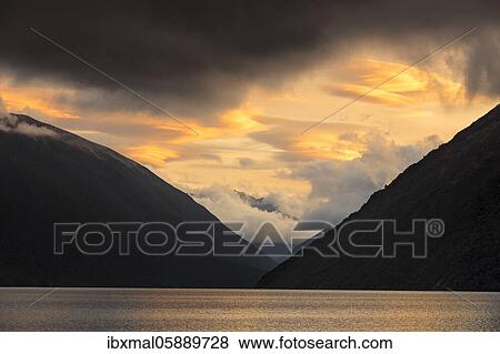 Sunset at Lake Rotoiti, Oceania, Mount Robert, Nelson Lakes National Park, Tasman District, South Island, New Zealand, Oceania View Large Photo Image Stock Photo - Sunset at Lake Rotoiti, Oceania, Mount Robert, Nelson Lakes National Park, Tasman District, South Island, New Zealand, Oceania. Fotosearch