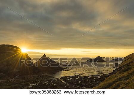 Sunset in the coastal landscape near Bedruthan Steps in Cornwall, Newquay, Great Britain View Large Photo Image Stock Image - Sunset in the coastal landscape near Bedruthan Steps in Cornwall, Newquay, Great Britain. Fotosearch