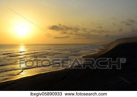 Sunset over the Pacific Ocean, near Camaná, Arequipa region, Peru, South America View Large Photo Image Stock Image - Sunset over the Pacific Ocean, near Camaná, Arequipa region, Peru, South America. Fotosearch