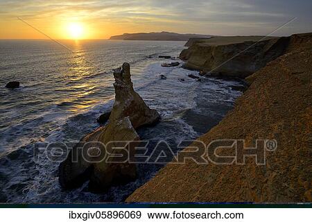 Sunset over the rock Catedral, Playa Supay, Paracas National Reserve, Paracas, Ica Region, Peru, South America View Large Photo Image Stock Photo - Sunset over the rock Catedral, Playa Supay, Paracas National Reserve, Paracas, Ica Region, Peru, South America. Fotosearch