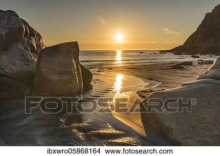 Sunset, rocky coast at Porth Nanven, St. Just, Cornwall, England, Great Britain View Large Photo Image Picture - Sunset, rocky coast at Porth Nanven, St. Just, Cornwall, England, Great Britain. Fotosearch