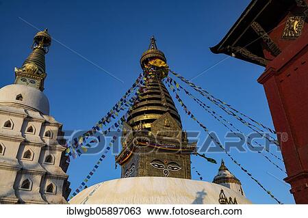 Swayambhunath, Stupa with the all-seeing eyes of Buddha, Buddhist sanctuary, temple complex, Kathmandu, Nepal, Asia View Large Photo Image Stock Image - Swayambhunath, Stupa with the all-seeing eyes of Buddha, Buddhist sanctuary, temple complex, Kathmandu, Nepal, Asia. Fotosearch