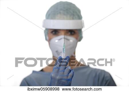 Symbol image Corona vaccine, doctor with syringe, corona crisis, Baden-Württemberg, Germany, Europe View Large Photo Image Stock Photo - Symbol image Corona vaccine, doctor with syringe, corona crisis, Baden-Württemberg, Germany, Europe. Fotosearch