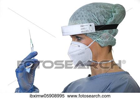 Symbol image Corona vaccine, doctor with syringe, corona crisis, Baden-Württemberg, Germany, Europe View Large Photo Image Stock Photography - Symbol image Corona vaccine, doctor with syringe, corona crisis, Baden-Württemberg, Germany, Europe. Fotosearch