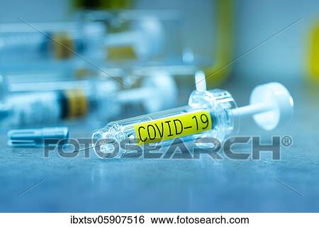 Syringe labelled COVID-19, Coronavirus vaccine View Large Photo Image Stock Photograph - Syringe labelled COVID-19, Coronavirus vaccine. Fotosearch