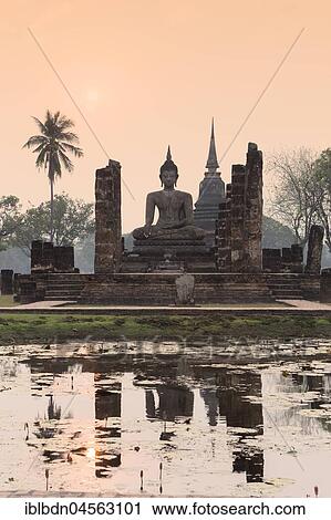 Temple hall Wat Mahathat Sukhothai with witting Buddha, dusk, Sukhothai historical park, Sukhothai, Thailand, Asia View Large Photo Image Stock Image - Temple hall Wat Mahathat Sukhothai with witting Buddha, dusk, Sukhothai historical park, Sukhothai, Thailand, Asia. Fotosearch