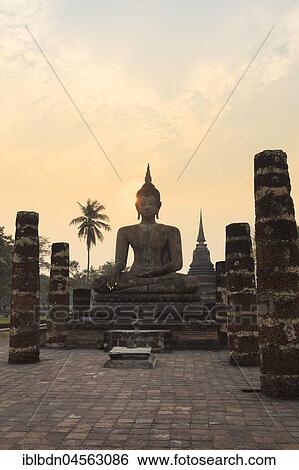 Temple Wat Mahathat Sukhothai, sitting Buddha, sunset, Sukhothai historical park, Sukhothai, Thailand, Asia View Large Photo Image Stock Photograph - Temple Wat Mahathat Sukhothai, sitting Buddha, sunset, Sukhothai historical park, Sukhothai, Thailand, Asia. Fotosearch