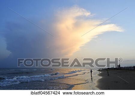 Thundercloud over the sea, storm front, sandy beach, Bibione, Adriatic Sea, Veneto, Italy, Europe View Large Photo Image Picture - Thundercloud over the sea, storm front, sandy beach, Bibione, Adriatic Sea, Veneto, Italy, Europe. Fotosearch