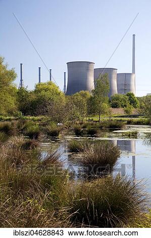 Stock Image - Tibaum nature reserve in Hamm and power plant Gersteinwerk in Werne, Ruhr area, North Rhine-Westphalia, Germany, Europe. Fotosearch