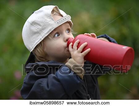 Toddler, boy, 2 years, drinks from water bottle, Stuttgart, Baden-Württemberg, Germany, Europe View Large Photo Image Stock Photo - Toddler, boy, 2 years, drinks from water bottle, Stuttgart, Baden-Württemberg, Germany, Europe. Fotosearch