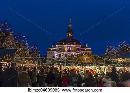 Town hall with Christmas market, colorful illuminated around Christmas time, Lüneburg, Lower Saxony, Germany, Europe View Large Photo Image Stock Image - Town hall with Christmas market, colorful illuminated around Christmas time, Lüneburg, Lower Saxony, Germany, Europe. Fotosearch