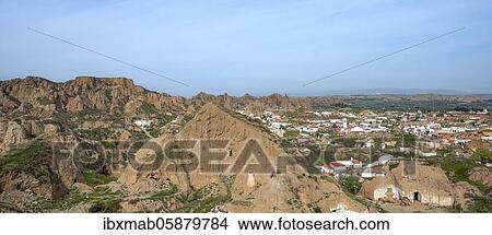 Picture - Troglodytos cave district, cave houses in rocks, Mirador Las Cuevas, Cerro de la Bala, Guadix, Granada province, Spain, Europe. Fotosearch