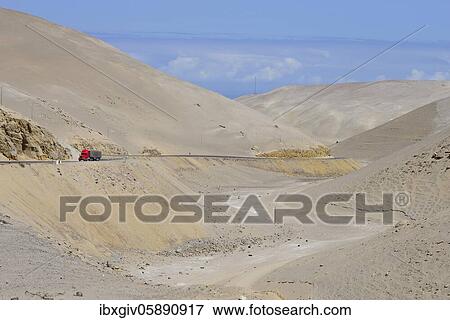 Trucks on the Panamericana, near Camaná, Arequipa region, Peru, South America View Large Photo Image Stock Photo - Trucks on the Panamericana, near Camaná, Arequipa region, Peru, South America. Fotosearch