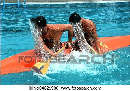 Stock Photograph - Two wet paddlers in a kayak ca. 1970s, exact place unknown, Czech Republic, Europe. Fotosearch