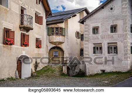 Stock Photography - Typical house fronts in the village centre, mountain village Guarda, Inn Valley, Lower Engadine, Engadine, Grisons, Switzerland, Europe. Fotosearch