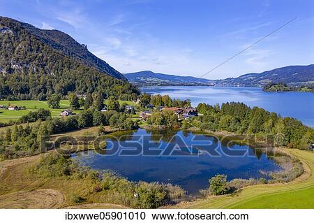 Stock Image - UAV photo, Egelsee in Scharfling behind it Mondsee, Mondseeland, Salzkammergut, Upper Austria, Austria, Europe. Fotosearch