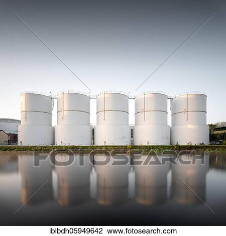 Stock Image - Unitank storage tanks for heating oil and diesel fuel at the Berlin Teltow Canal in Rudow, Berlin, Germany, Europe. Fotosearch