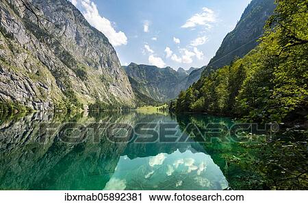 Stock Image - Upper Lake with reflection, Salet am Königssee, Berchtesgaden National Park, Berchtesgadener Land district, Upper Bavaria, Bavaria, Germany, Europe. Fotosearch