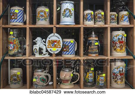 Stock Photo - Various beer mugs with Bavarian motifs for sale, Munich, Upper Bavaria, Bavaria, Germany, Europe. Fotosearch