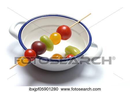 Various cherry tomatoes on wooden skewers on a bowl, Germany, Europe View Large Photo Image Stock Image - Various cherry tomatoes on wooden skewers on a bowl, Germany, Europe. Fotosearch