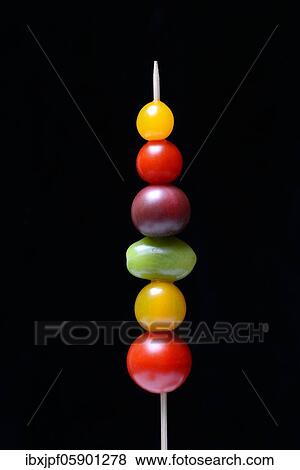 Various cherry tomatoes on wooden skewers, Germany, Europe View Large Photo Image Stock Photo - Various cherry tomatoes on wooden skewers, Germany, Europe. Fotosearch