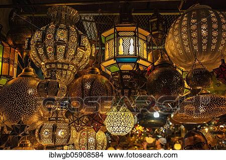 Various lamps made of brass or copper and colored glass for sale hung up, souk, bazaar, Marrakech, Morocco, Africa View Large Photo Image Picture - Various lamps made of brass or copper and colored glass for sale hung up, souk, bazaar, Marrakech, Morocco, Africa. Fotosearch