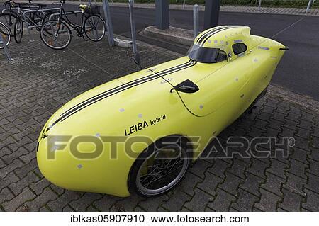 Velomobile Leiba Hybrid, recumbent bike with electric motor, aerodynamically clad, environmentally friendly, Düsseldorf, North Rhine-Westphalia, Germany, Europe View Large Photo Image Stock Image - Velomobile Leiba Hybrid, recumbent bike with electric motor, aerodynamically clad, environmentally friendly, Düsseldorf, North Rhine-Westphalia, Germany, Europe. Fotosearch