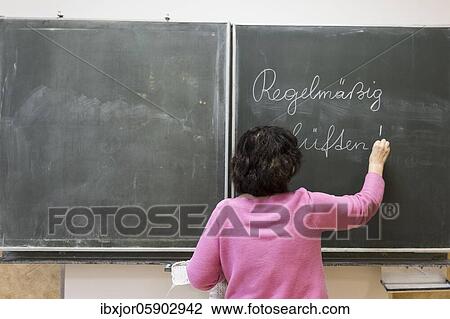 Ventilation in school, teacher writes on blackboard, Austria, Europe View Large Photo Image Stock Image - Ventilation in school, teacher writes on blackboard, Austria, Europe. Fotosearch