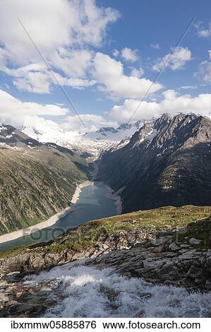 View from the Berliner Höhenweg to the Schlegeis reservoir, Schlegeis reservoir, Zillertal Alps, Schlegeiskees glacier, Zillertal, Tyrol, Austria, Europe View Large Photo Image Stock Photograph - View from the Berliner Höhenweg to the Schlegeis reservoir, Schlegeis reservoir, Zillertal Alps, Schlegeiskees glacier, Zillertal, Tyrol, Austria, Europe. Fotosearch
