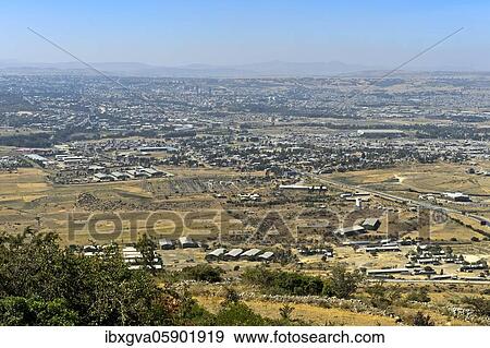 Stock Photo - View from the edge of the African Rift Valley to the city of Mek'ele, Mek'ele, Tigray Region, Ethiopia, Africa. Fotosearch