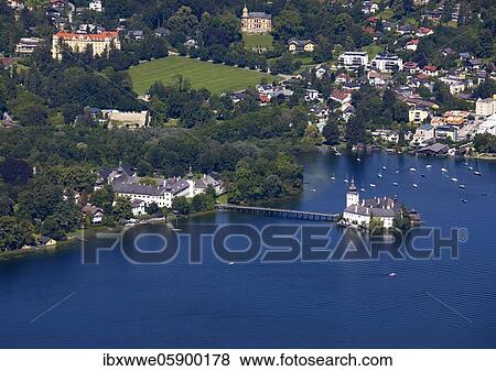 Stock Photo - View from the treetop path at Grünberg to Lake Traun Castle Ort and Gmunden, Salzkammergut, Upper Austria, Austria, Europe. Fotosearch