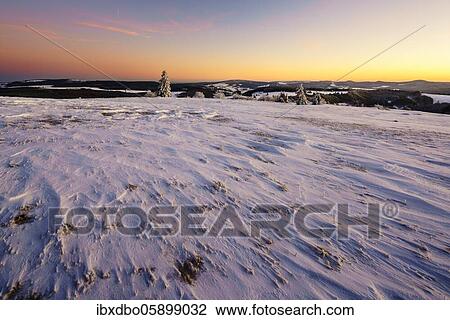 Stock Image - View from Wasserkuppe in south direction in winter, dusk, nature park Park Hessian Rhön, Hesse, Germany, Europe. Fotosearch