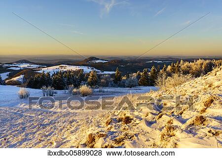 View from Wasserkuppe in west direction in winter, sunset, nature park Park Hessian Rhön, Hesse, Germany, Europe View Large Photo Image Stock Photo - View from Wasserkuppe in west direction in winter, sunset, nature park Park Hessian Rhön, Hesse, Germany, Europe. Fotosearch
