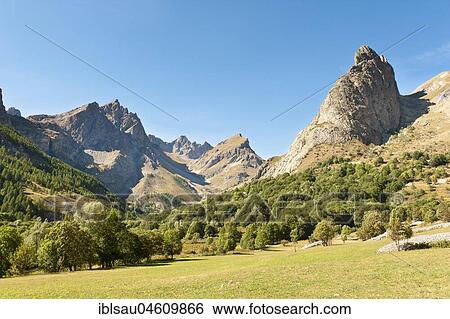 Stock Photograph - View of cliffs Rocca Provencale, Chiappera, Valle Maira, Province of Cuneo, Piedmont, Italy, Europe. Fotosearch