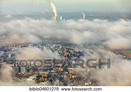 View of downtown Hamm through the low fog cover, Pauluskirche, new Lippe project Kanalkante, between Hamm-Lippewiesen airport and downtown Hamm, Datteln-Hamm Canal, Lippe, Hamm, Ruhr area, North Rhine-Westphalia, Germany, Europe View Large Photo Image Stock Photo - View of downtown Hamm through the low fog cover, Pauluskirche, new Lippe project Kanalkante, between Hamm-Lippewiesen airport and downtown Hamm, Datteln-Hamm Canal, Lippe, Hamm, Ruhr area, North Rhine-Westphalia, Germany, Europe. Fotosearch