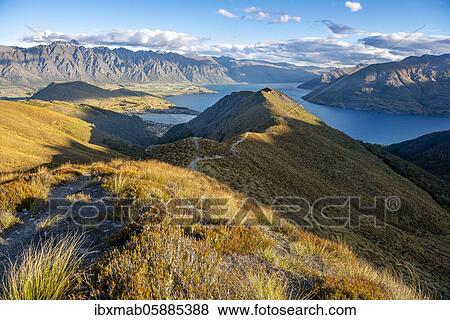 Stock Photo - View of Lake Wakatipu and Mountain Range The Remarkables, Ben Lomond, Southern Alps, Otago, South Island, New Zealand, Oceania. Fotosearch