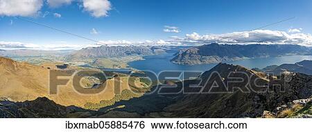 Stock Photograph - View of Lake Wakatipu and Mountain Range The Remarkables, Ben Lomond, Southern Alps, Otago, South Island, New Zealand, Oceania. Fotosearch