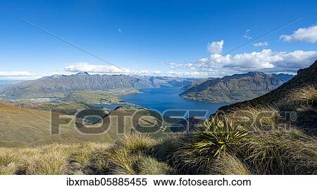 Stock Photography - View of Lake Wakatipu and Mountain Range The Remarkables, Ben Lomond, Southern Alps, Otago, South Island, New Zealand, Oceania. Fotosearch