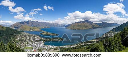 Stock Image - View of Lake Wakatipu and Queenstown, Ben Lomond Scenic Reserve, The Remarkables mountain range, Otago, South Island, New Zealand, Oceania. Fotosearch