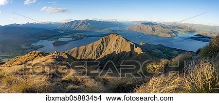 View of mountains and lake from Mount Roy, Roys Peak in the evening light, Lake Wanaka, Southern Alps, Otago, South Island, New Zealand, Oceania View Large Photo Image Picture - View of mountains and lake from Mount Roy, Roys Peak in the evening light, Lake Wanaka, Southern Alps, Otago, South Island, New Zealand, Oceania. Fotosearch