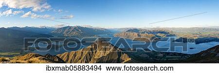 Picture - View of mountains and lake from Mount Roy, Roys Peak at sunset, Panorama, Lake Wanaka, Southern Alps, Otago, South Island, New Zealand, Oceania. Fotosearch