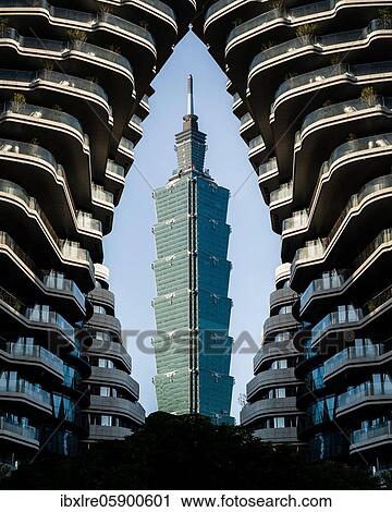 View of Taipei 101 Tower, framed by a high-rise building, Taipei, Taiwan, Asia View Large Photo Image Stock Image - View of Taipei 101 Tower, framed by a high-rise building, Taipei, Taiwan, Asia. Fotosearch