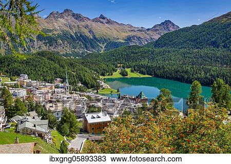 Stock Image - Village overview with Lake St. Moritz, St. Moritz, Bernina Alps, Upper Engadine, Engadine, Grisons, Switzerland, Europe. Fotosearch