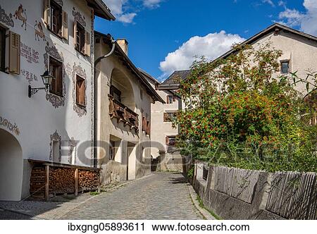 Village street with typical houses, mountain village Guarda, Inn valley, Lower Engadine, Engadine, Grisons, Switzerland, Europe View Large Photo Image Stock Image - Village street with typical houses, mountain village Guarda, Inn valley, Lower Engadine, Engadine, Grisons, Switzerland, Europe. Fotosearch