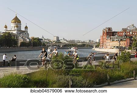 Visitors in Museon Park, on the river Moskva and Cathedral of the Saviour of Christ, Moscow, Russia, Europe View Large Photo Image Stock Photograph - Visitors in Museon Park, on the river Moskva and Cathedral of the Saviour of Christ, Moscow, Russia, Europe. Fotosearch