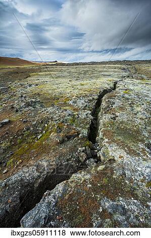 Volcanic fissure Grjótagjá with coloured moss in the Krafla, Skútustaðir, Norðurland eystra, Iceland, Europe View Large Photo Image Stock Photo - Volcanic fissure Grjótagjá with coloured moss in the Krafla, Skútustaðir, Norðurland eystra, Iceland, Europe. Fotosearch