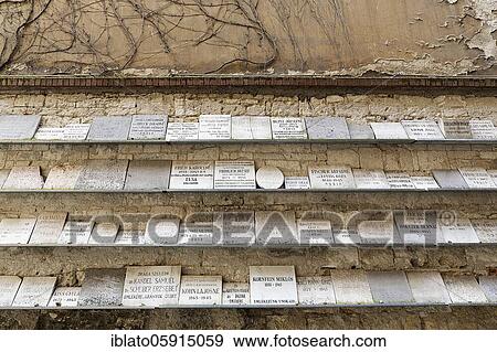 Stock Photo - Wall with plaques commemorating the murdered Jews and the Holocaust, Great Synagogue, Nagy Zsinagóga, Pest district, Budapest, Hungary, Europe. Fotosearch