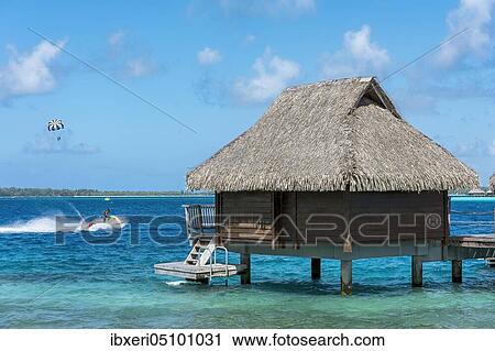 Water sports and overwater bungalow in the lagoon, Maitai hotel complex, Bora Bora, French Polynesia, Oceania View Large Photo Image Stock Image - Water sports and overwater bungalow in the lagoon, Maitai hotel complex, Bora Bora, French Polynesia, Oceania. Fotosearch