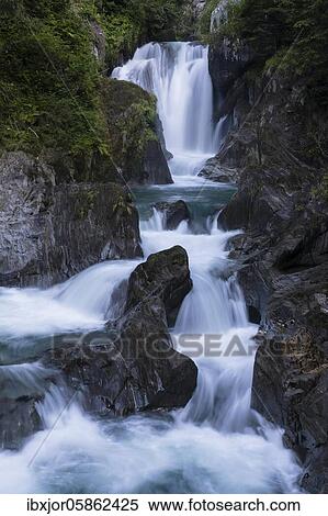 Waterfall and cascades in the Groppenstein Gorge, Obervellach, Drautal, Carinthia, Austria, Europe View Large Photo Image Stock Photography - Waterfall and cascades in the Groppenstein Gorge, Obervellach, Drautal, Carinthia, Austria, Europe. Fotosearch